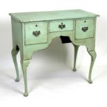 A George III style painted oak lowboy with three frieze drawers, 85cms (33.25ins) wide.