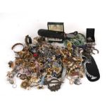 A quantity of costume jewellery to include necklaces, bangles, earrings and other items.