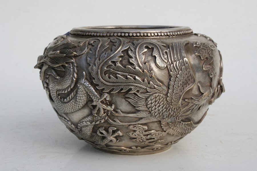 A large Chinese silvered bronze censer decorated in relief with a dragon and phoenix, four character - Image 4 of 12