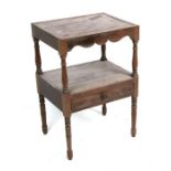 A 19th century mahogany wash stand with turned supports joined by an under-tier drawer, 46cms (