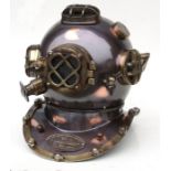 A reproduction copper & brass US Navy diving helmet, 42cms (16.5ins) high.