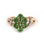 A 9ct gold green stone and diamond cluster ring, approx UK size 'K', 2.8g.