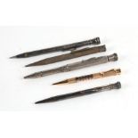 An Eversharp silver plated propelling pencil; together with three similar and a gold plated