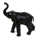 An Abercrombie & Fitch Liberty style leather elephant, 51cms (20ins) wide.