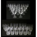 An extensive suite of Edinburgh Crystal Iona pattern cut glass glasses to include wine glasses,