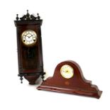 A Vienna style wall clock in a mahogany and ebonised case, 56cms (22ins) high; together with an