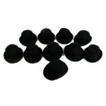 A collection of ten bowler hats, including Austin Reed and Dunn & Co. examples (10).