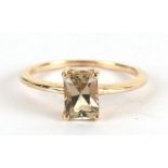 A 9ct gold ring set with a rectangular pale yellow stone (possibly citrine), approx UK size 'L', 1.