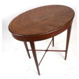 An Edwardian Sheraton style satinwood occasional table, the oval top with parquetry inlay and