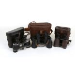 A pair of Ross of London binoculars, cased; together with two similar pairs (3).