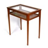 An Edwardian mahogany table bijouterie with crossbanded decoration and boxwood stringing, on