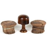 Two early 20th century French treen milliner's blocks; together with another similar, the largest