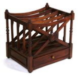 A Georgian style hardwood four-division Canterbury, 48cms (19ins) wide.