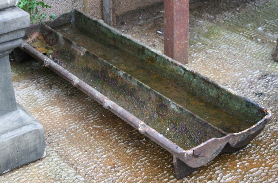 A cast iron pig trough / planter, 92cms (36ins) wide.Condition Reporthole at one end