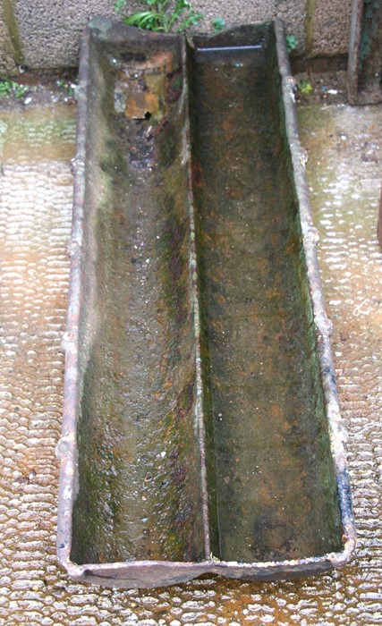 A cast iron pig trough / planter, 92cms (36ins) wide.Condition Reporthole at one end - Image 2 of 2