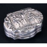 A continental silver snuff box with shell back and ornate figural scene to the front. 6cm ( 2.25