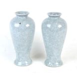 A pair of Chinese crackle glaze baluster vases, 25cms (9.75ins) high.