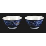 A pair of Chinese blue & white bowl decorated with dragons chasing a flaming pearl, blue six