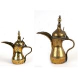 Two Turkish / Islamic dallah brass coffee pots. larges 28cm 11 ins) high
