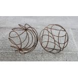A pair of steel openwork garden spheres, 43cms (17ins) diameter.Condition ReportGood overall