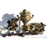 A brass samovar, 33cms (13ins) wide; together with a brass tray and other similar metal wares.