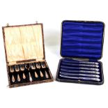 A set of six Victorian silver handled butter knives, Sheffield 1896, cased; together with a set of