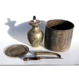 An Islamic brass jardiniere, 30cms (12ins) wide; together with an Eastern dagger with brass