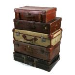 A group of five vintage suitcases, the largest 73cms (28.75ins) wide.