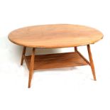 An Ercol blonde elm coffee table with an oval top above an under-tier on tapering legs, 110cms (