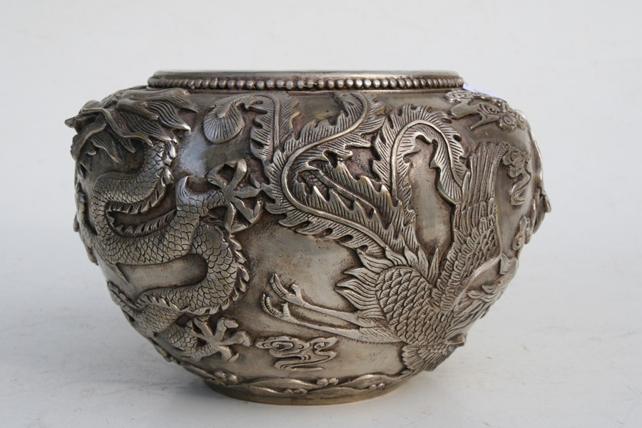 A large Chinese silvered bronze censer decorated in relief with a dragon and phoenix, four character - Image 6 of 12