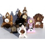 A quantity of French late 19th century and later mantle clocks, all for restoration or spares.