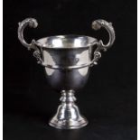 A silver two-handled trophy cup, London 1925, weight 330g, 12.5cms (5ins) diameter.