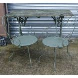 A painted cast iron garden table with wooden slatted top, 138cms (54ins) wide; together with two