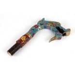 A Chinese cloisonne walking cane handle in the form of a dragon.