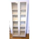 An Ikea White glazed 'Billy' display cabinet, 79cms (31ins) wide.