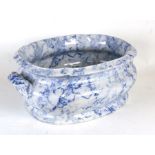 A 19th century Copeland blue & white foot bath, 48cms (19ins) wide (a/f).