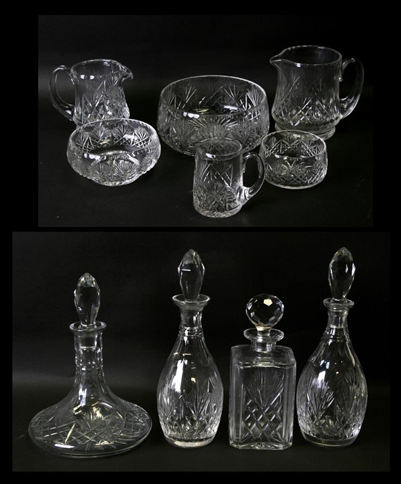 A pair of Edinburgh Crystal Iona pattern cut glass decanters, 32cms (12.5ins) high; together with