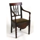 A 19th century mahogany child's open armchair with pierced back splat, upholstered seat, shaped