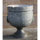 A granite font, 30cms (12ins) diameter.Condition Report There are chips to the upper rim and the