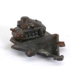 An unusual bronze effect metal WW1 Tank and Ashtray. The tank is 7.5cms (3ins) long. No makers name