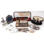 A George V silver three-piece condiment set, Birmingham 1919, cased; together with an antler handled