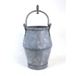 A galvanised and riveted well bucket, 40cms (15.75ins) high excluding handle.Condition ReportGood