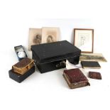 A tin deed box containing late 19th / early 20th century photograph album, a tooled leather gilt