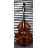 A decorative double bass with single piece back, sign written 'Live Jazz & Rhythm 'n' Blues Every