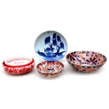 A Japanese Imari pattern bowl with fluted rim, blue character mark to base, 30cms (12ins)