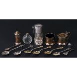 A silver three piece cruet set, a quantity of silver spoons, a scent bottle and other items
