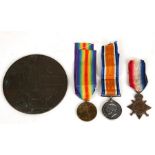 A WWI medal trio awarded to J.30157 FS Earle of Royal Navy; together with a death plaque named