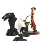 An Art Deco style group depicting a lady walking a Borzoi, 44cms (17.25ins) high; together with a
