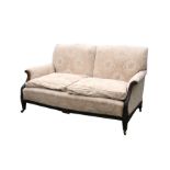 An Edwardian mahogany upholstered sofa, 156cms (61.5ins) wide.