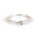 A 9ct white gold diamond solitaire ring, approx UK size 'Q', 2g.